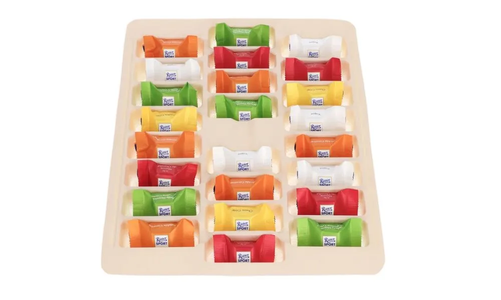Gepersonaliseerde Ritter Sport adventskalender 2026 inhoud